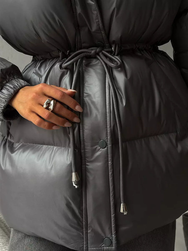 Puffer jacket waist detail
