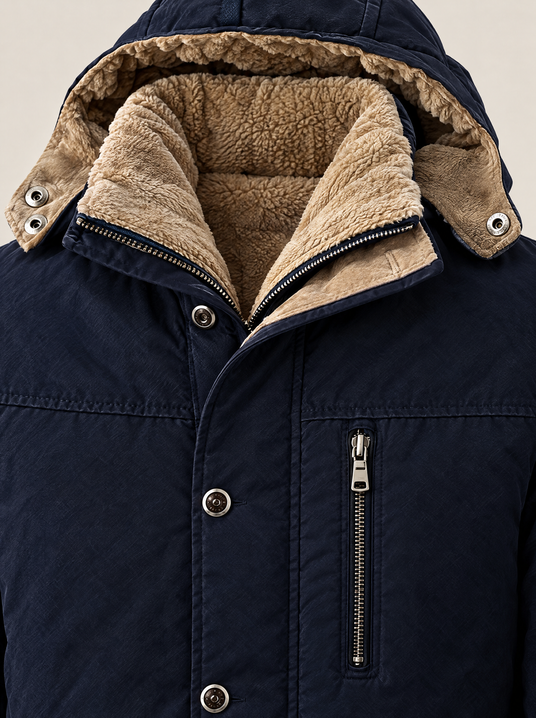 Erik parka detail with fleece-lined hood and chest pocket, navy