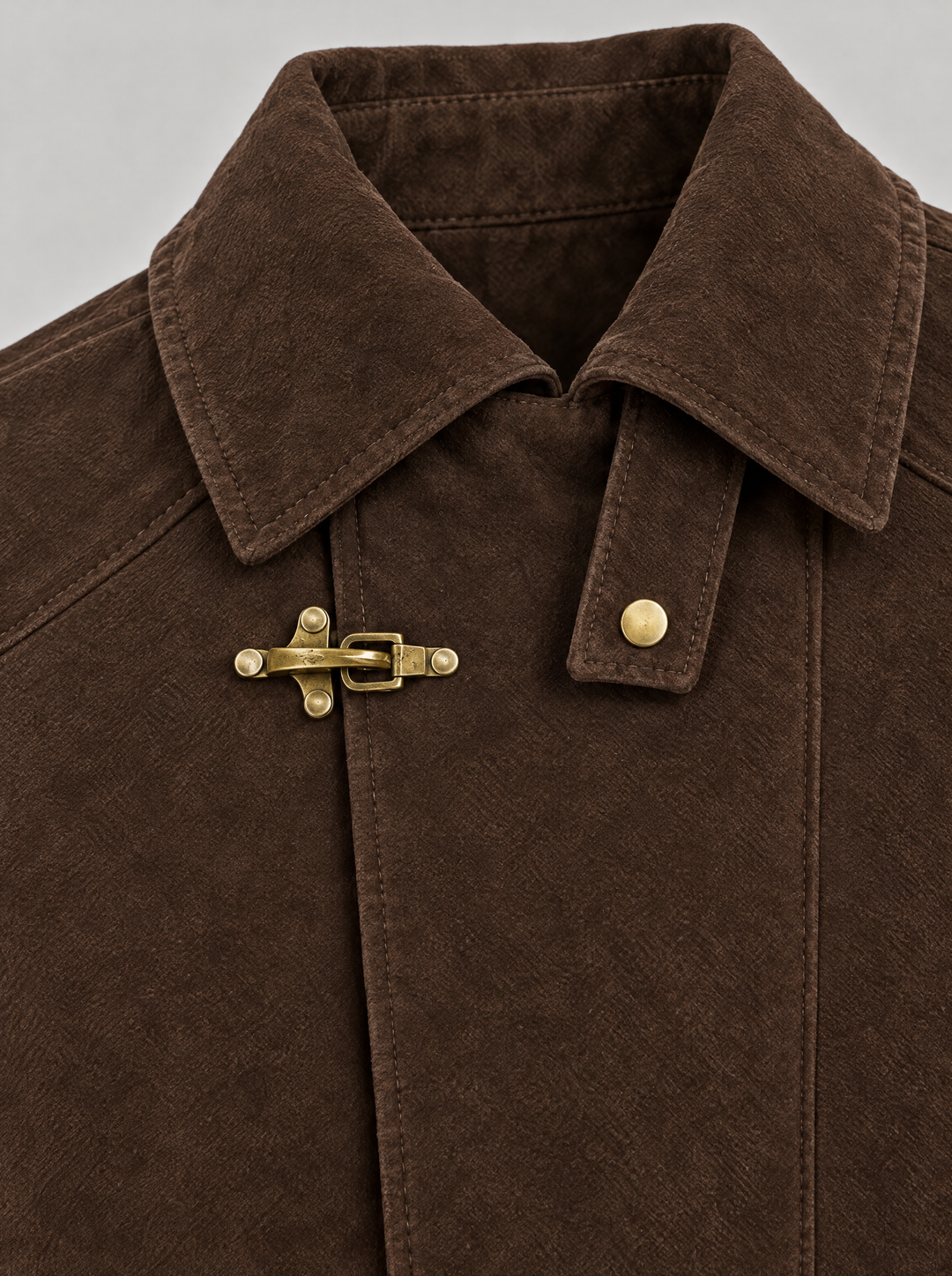 Rufus toggle jacket collar and metal toggle clasp, detail